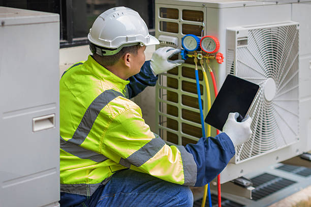 Professional Emergency Ac Repair technician working in Ocean Beach, NY